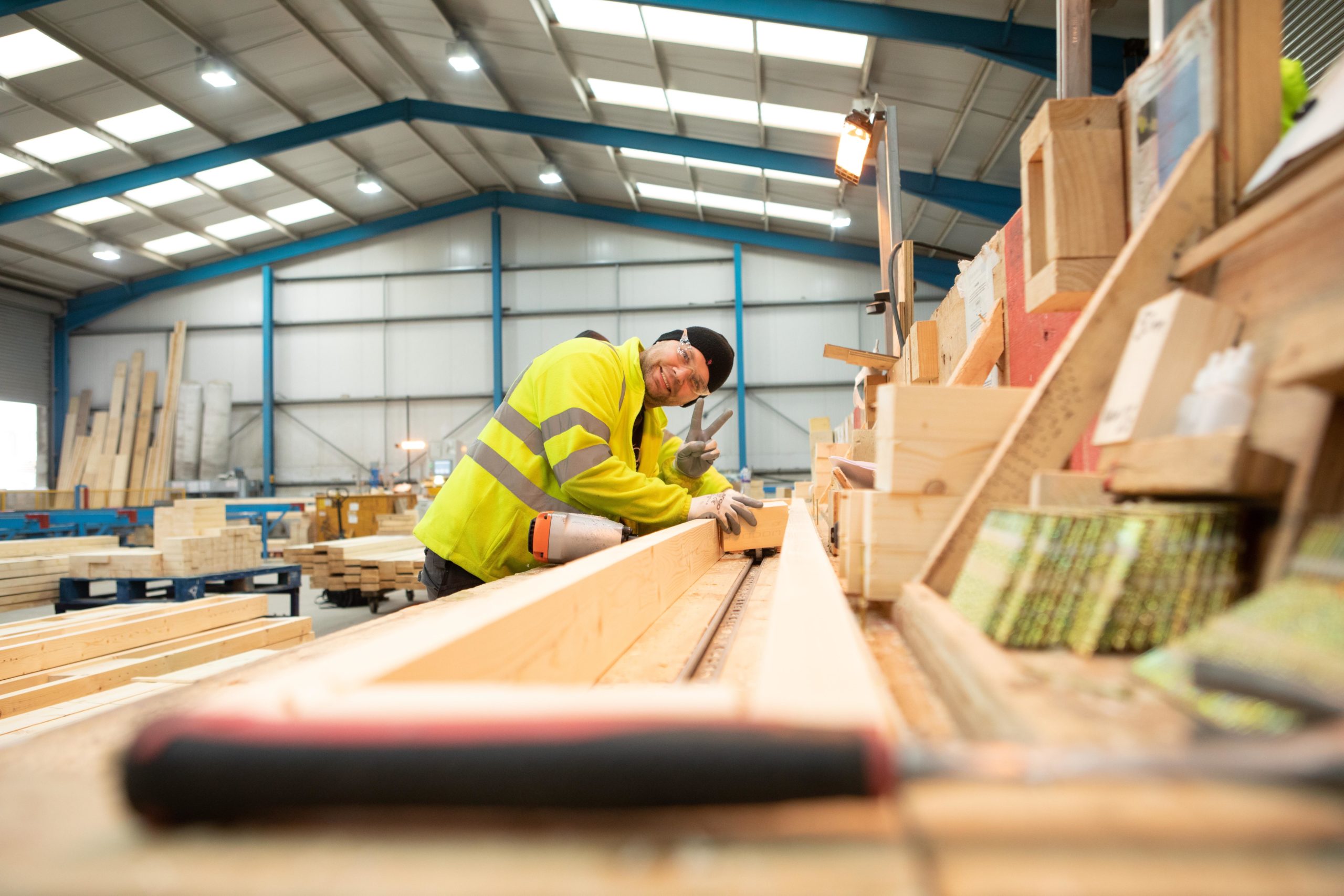 Donaldson Group Employee producing a wood product in a factory