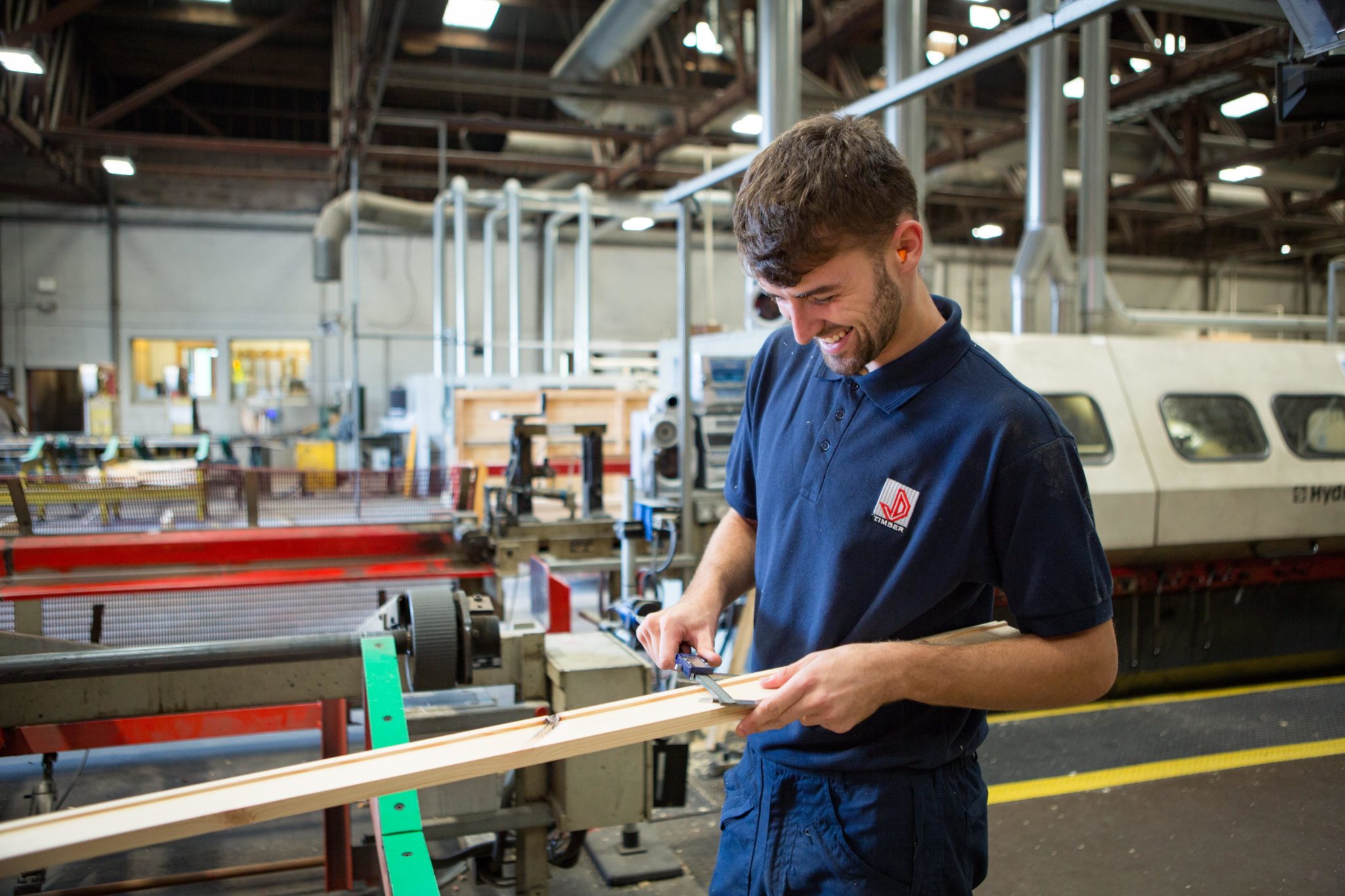 A Donaldson Group Employee working inside a factory