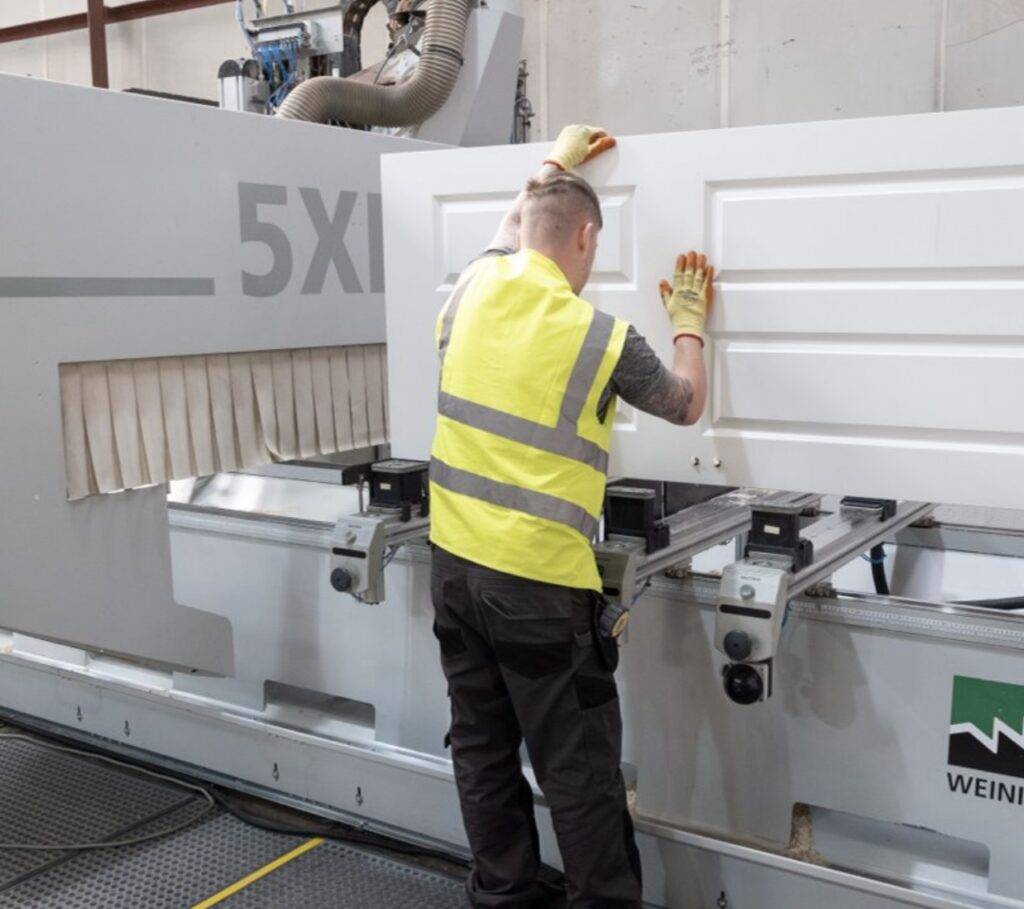 A Donaldson Doors employee constructing a residential internal door